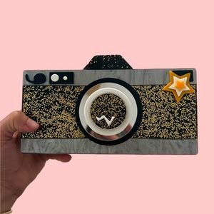 RARE: The Ultimate Camera Clutch for Your Night Out